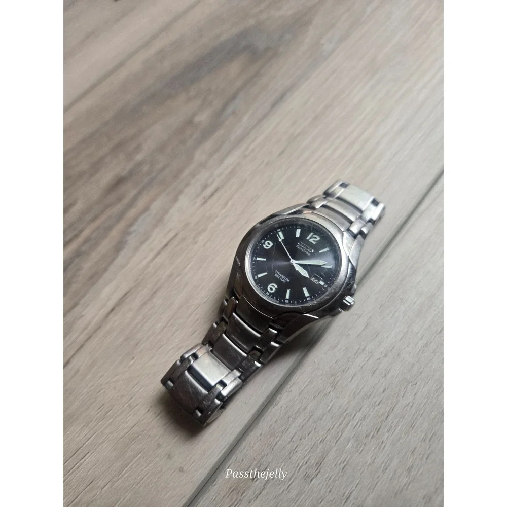 Citizen Watch Mens Eco-Drive Titanium WR100 Black Dial Date Bracelet Field Watch